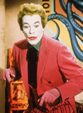 Caesar Romero as the Joker